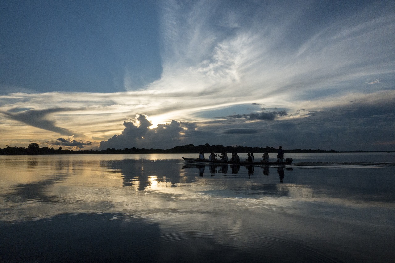 black river, sunrise, boat